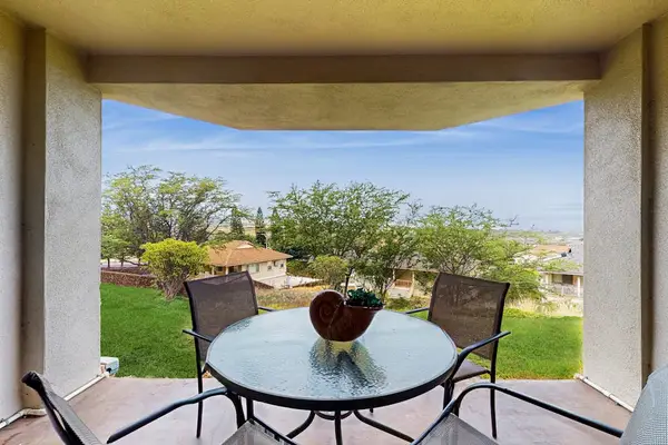 Private lanai with outdoor dining and ocean views.