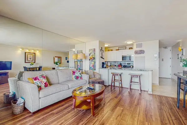 Living room with comfortable sleeper sofa and a flat screen tv.