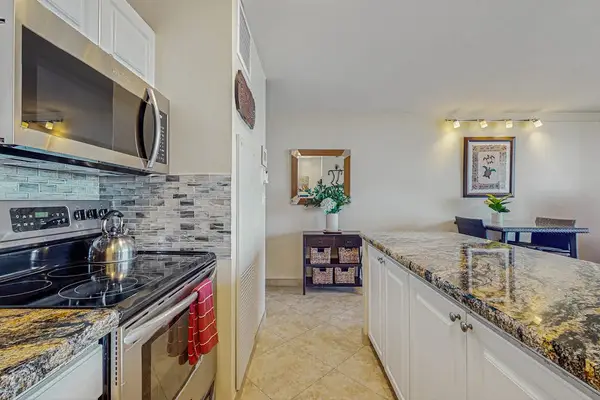 Fully remodeled kitchen with stainless steel appliances.