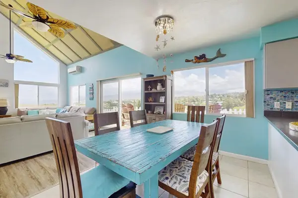 Dining room with seating for six.  Relax from the comfort of your home.