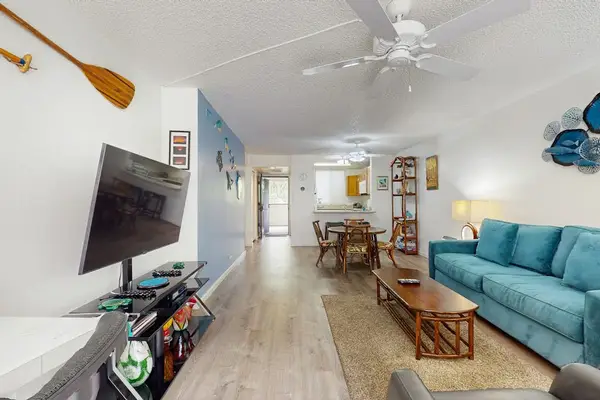 Open Living Space With Island Charm