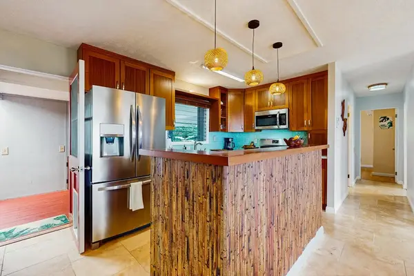 Gourmet Kitchen with Wood Island & Stainless Steel Appliances