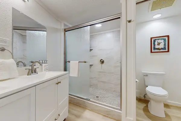 Refreshing Primary En-Suite With Custom Glass Walk-In Shower