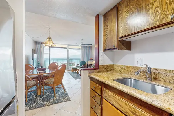 The functional kitchen offers generous counter space and everything you need for effortless cooking.