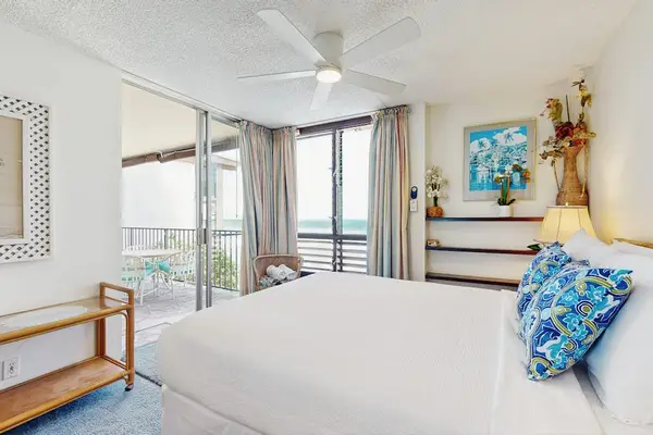 Wake up to soothing ocean views from the comfort of your bright island-inspired bedroom.