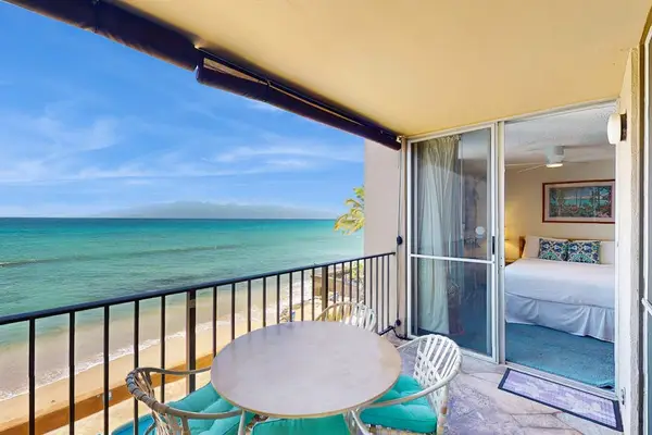 Unwind on the private lanai with panoramic ocean views and refreshing island breezes.