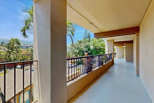 Walk through the open-air hallway surrounded by tropical scenery and fresh island breezes.