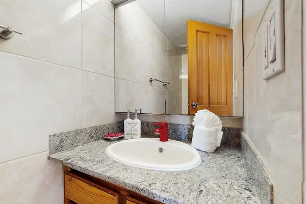 Start and end your day with a well-appointed bathroom and generous counter space.
