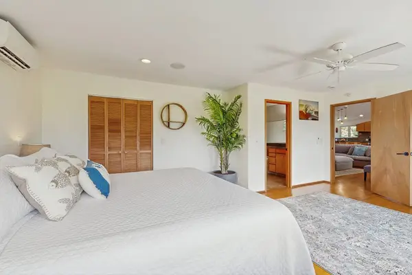 Master bedroom decorated in a modern tropical style