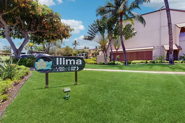 Resort grounds showcase manicured lawns palms and colorful island landscaping