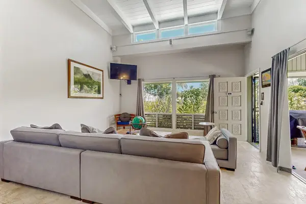 Airy Living Room View Highlighting Soaring Ceilings & Clerestory Windows