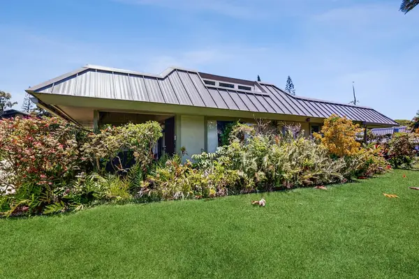 Lush Tropical Garden Surroundings Framing the Exterior Walkway