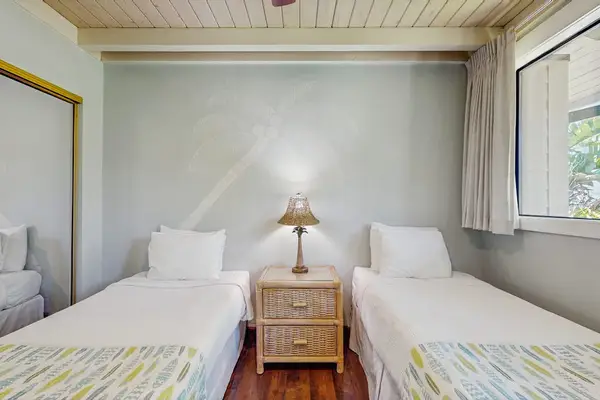 Cozy Twin Beds In A Breezy Bedroom