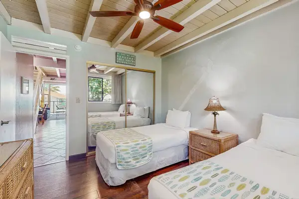 Welcoming Twin Bedroom With Tropical Touches