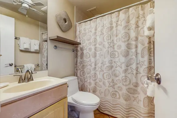 Charming Full Bathroom With Coastal Flair