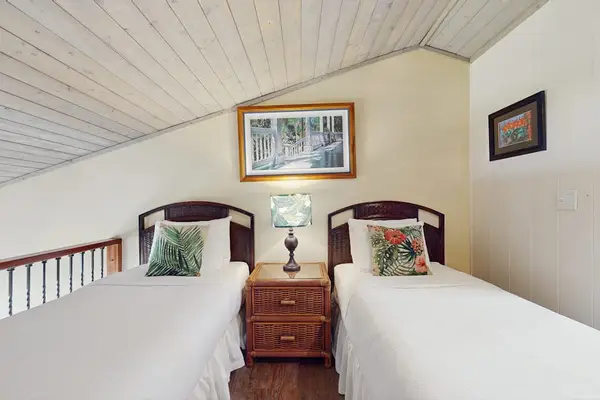 Charming Loft Bedroom With Island Vibes