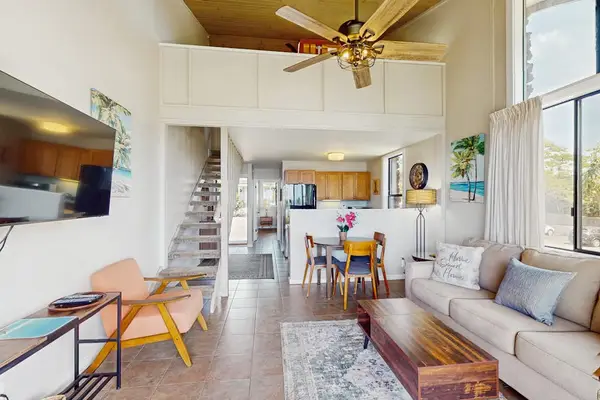 Spacious living room with soaring ceilings