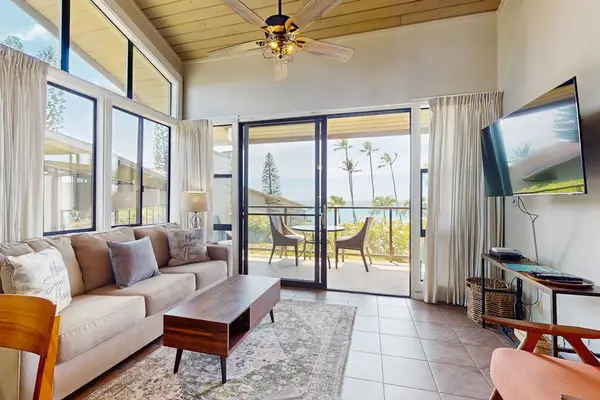 Bright living room with lanai access