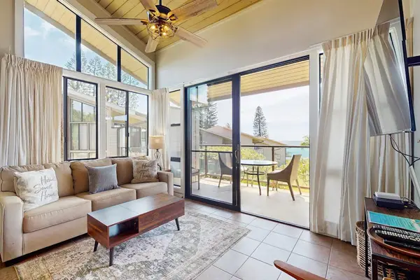 Comfortable living room with tropical views
