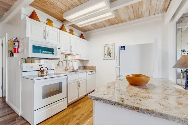 Updated fully stocked kitchen for all of the chef's needs.