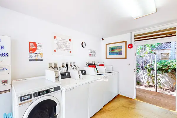 Coin laundry on property of Mahina Surf Resort available for your use during your stay.