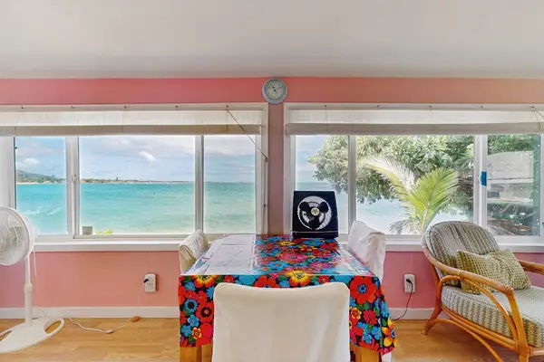 Dining area with ceiling fans and beautiful ocean views
