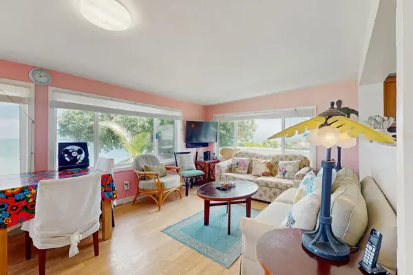 Bright living room with panoramic ocean views