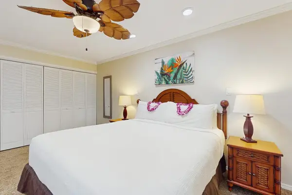 Large master bedroom with king bed, flat screen tv and en-suite bathroom.