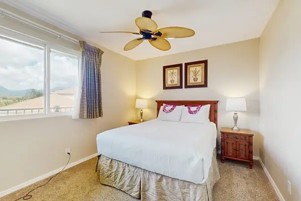Guest bedroom with queen bed.