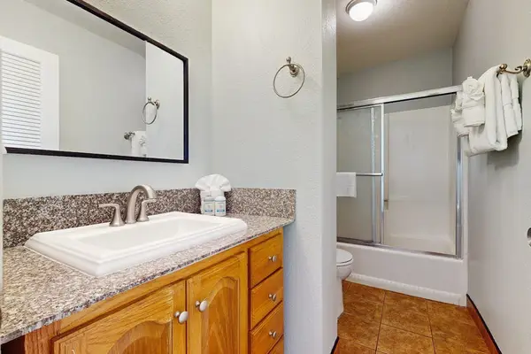 Master bathroom with tub/shower combo.