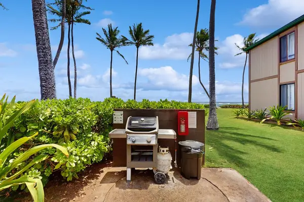 Pono Kai Resort, includes 12-acre grounds, an outdoor pool, a hot tub, a shuffleboard area, a barbecue facility with gas grills, a sauna, golf putting greens, Ping-Pong tables, a croquet lawn, a fitness center, tennis courts, and laundry facilities.