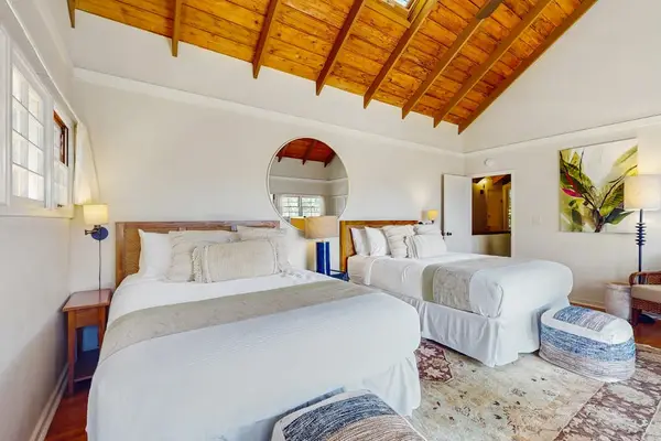 Stylish bedroom combines inviting comfort with a relaxing atmosphere for every memorable stay