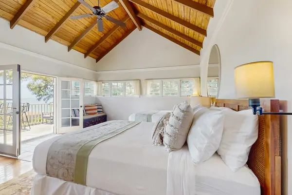 Charming bedroom provides a comfortable retreat for unforgettable tropical vacation experiences throughout stays