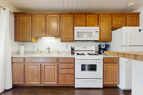 Full View of Kitchen Cabinetry, Appliances & Prep Counter
