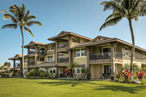 Rear Exterior View of Residential Complex & Manicured Lawn