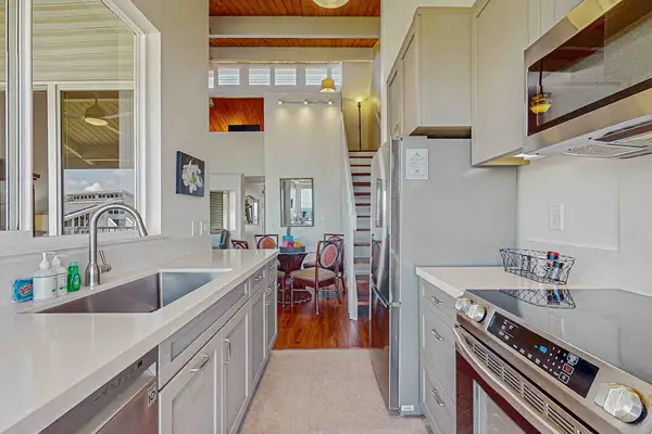 Newly remodeled kitchen with stainless steel appliances.