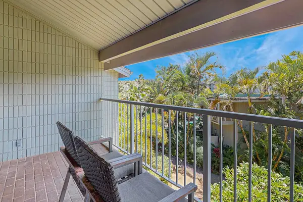 Large lanai with tropical views.