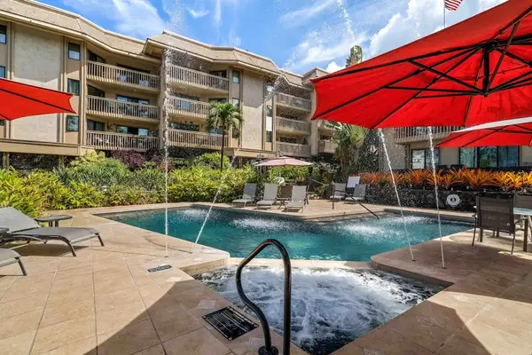 Hot tub next to pool area