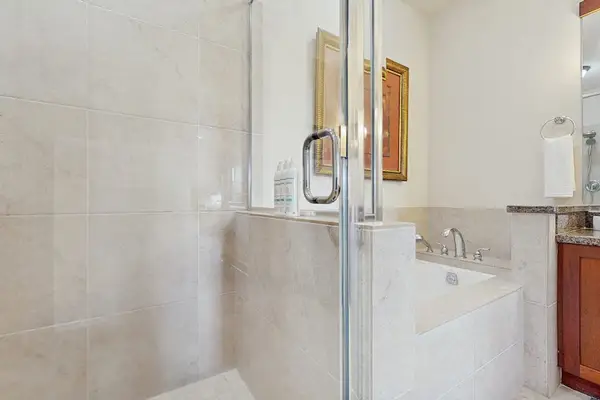 Primary En-Suite Walk-In Glass Shower & Soaking Tub