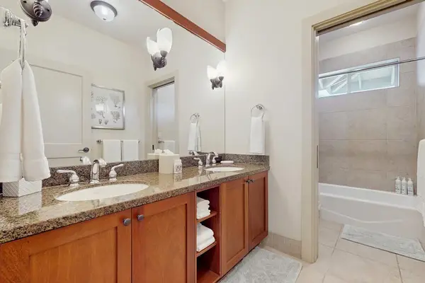 Full Guest Bathroom with Double Vanity & Combination Tub/Shower
