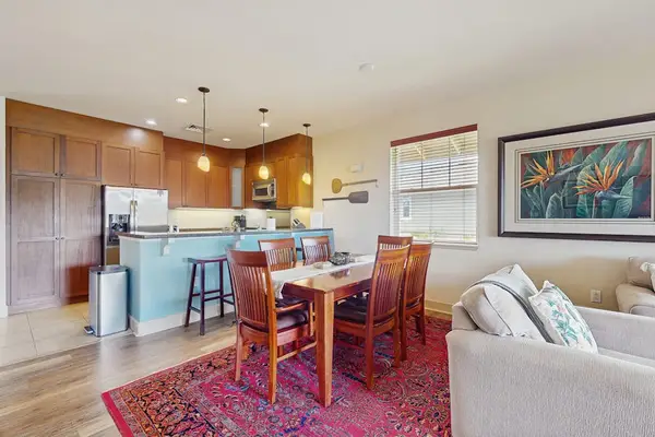 Spacious Dining Area with Seating for Six Adjacent to Kitchen