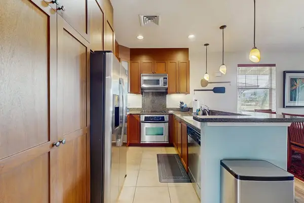 Gourmet Kitchen Layout with Modern Cabinetry & Granite Countertops