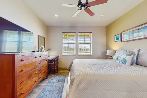 Primary Suite with Wall-Mounted Flat-Screen TV, Dresser & Workstation