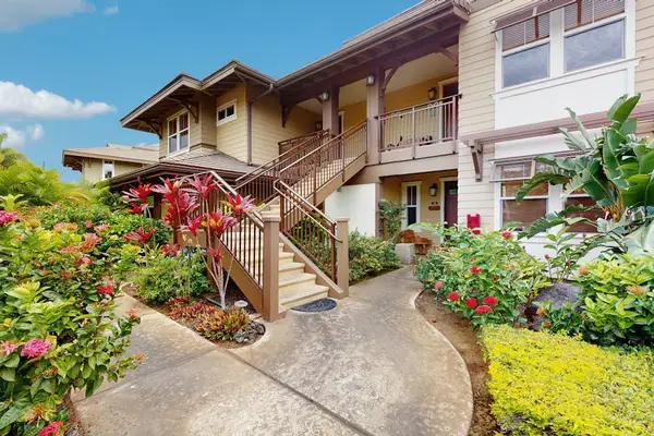 Tropical Exterior Walkway Leading to Property Staircase & Entrance