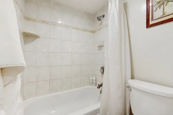 Full Bathroom With Tub And Shower