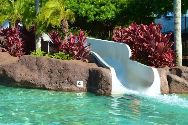 Resort Pool With Waterslide Fun