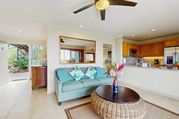 Open lounge connects relaxed furnishings with windows and island scenery