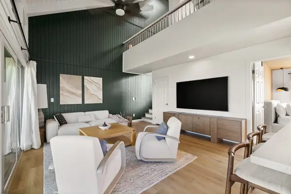 Spacious living room with a cozy seating area