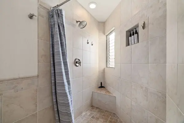 Walk-in shower in the en-suite bathroom
