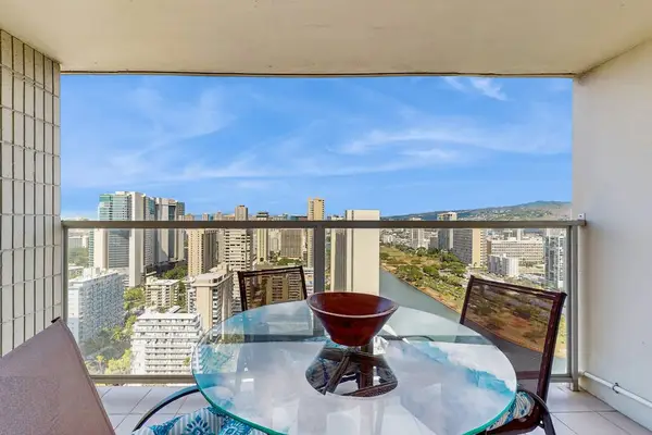 Enjoy outdoor dining on the private balcony overlooking Honolulu and the scenic Ala Wai Canal.